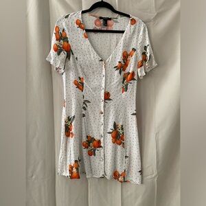 White dress with orange print